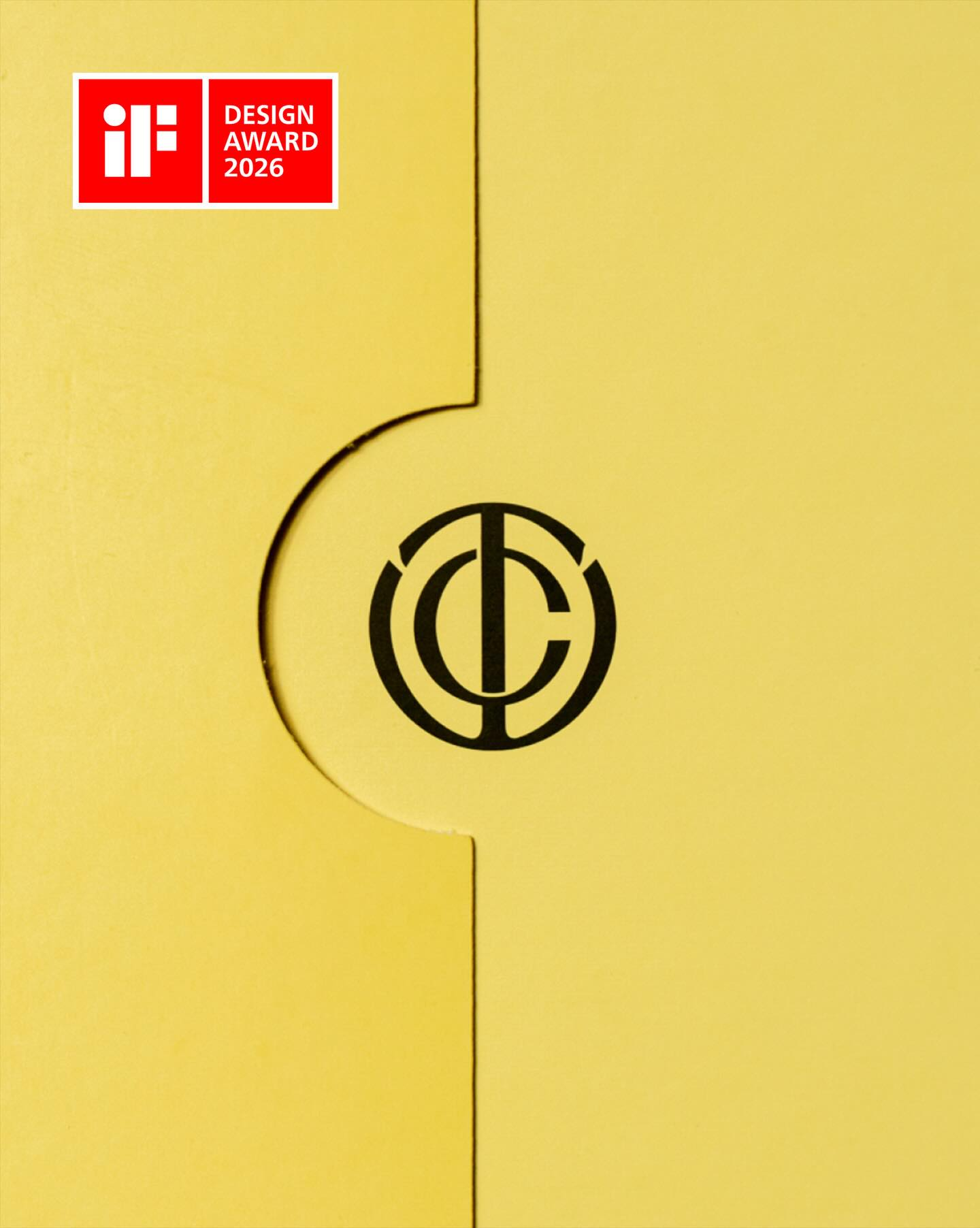 Yellow package with black monogram